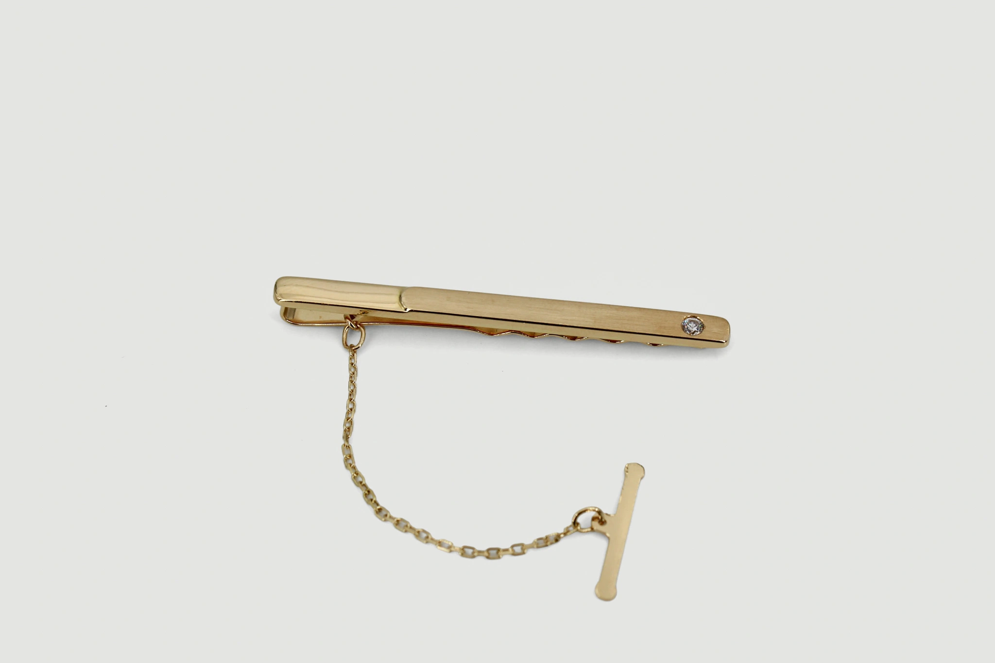 Broche de oro 18k con circonita
