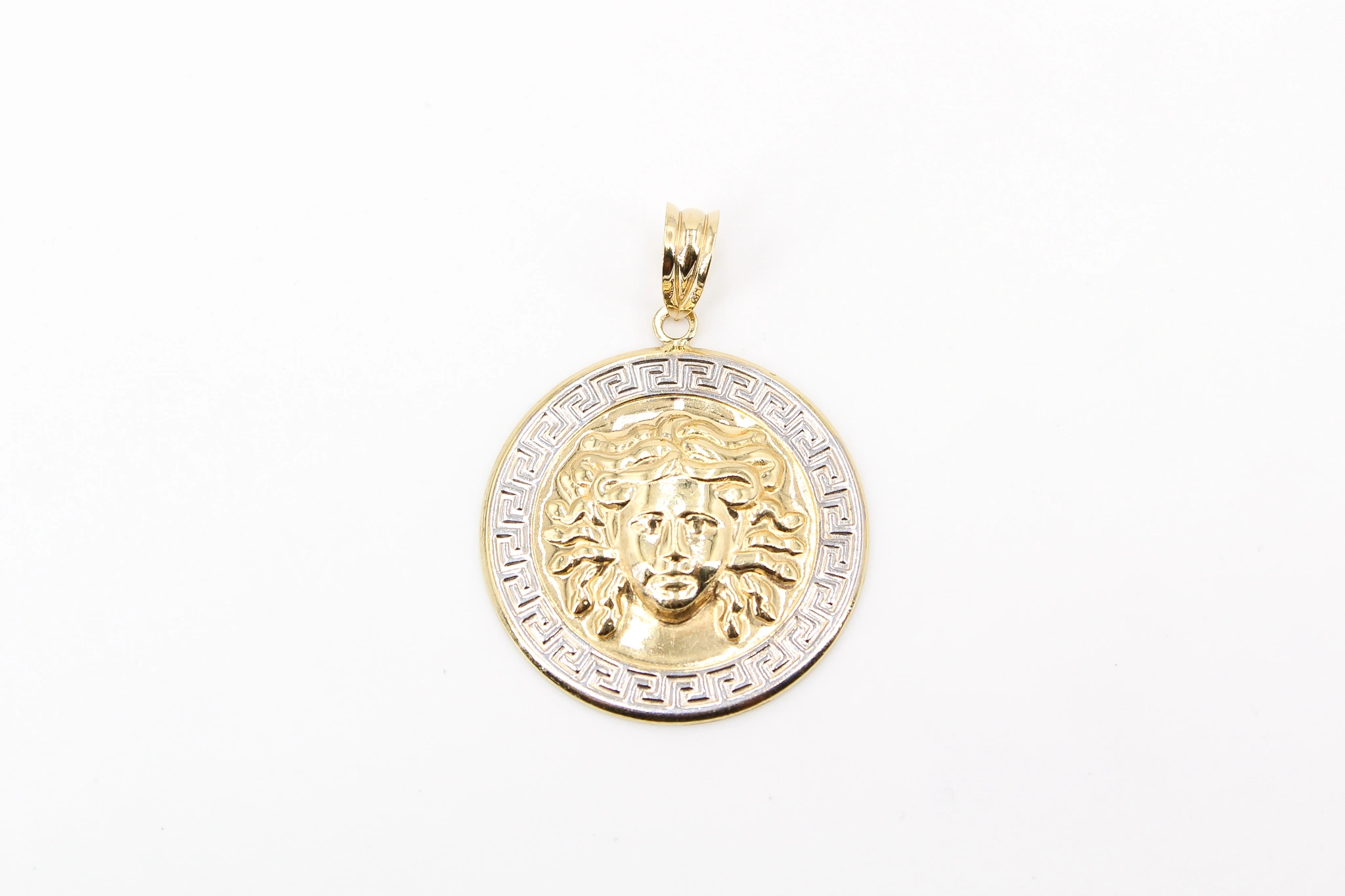 Medalla de Medusa en oro combinado de 18k