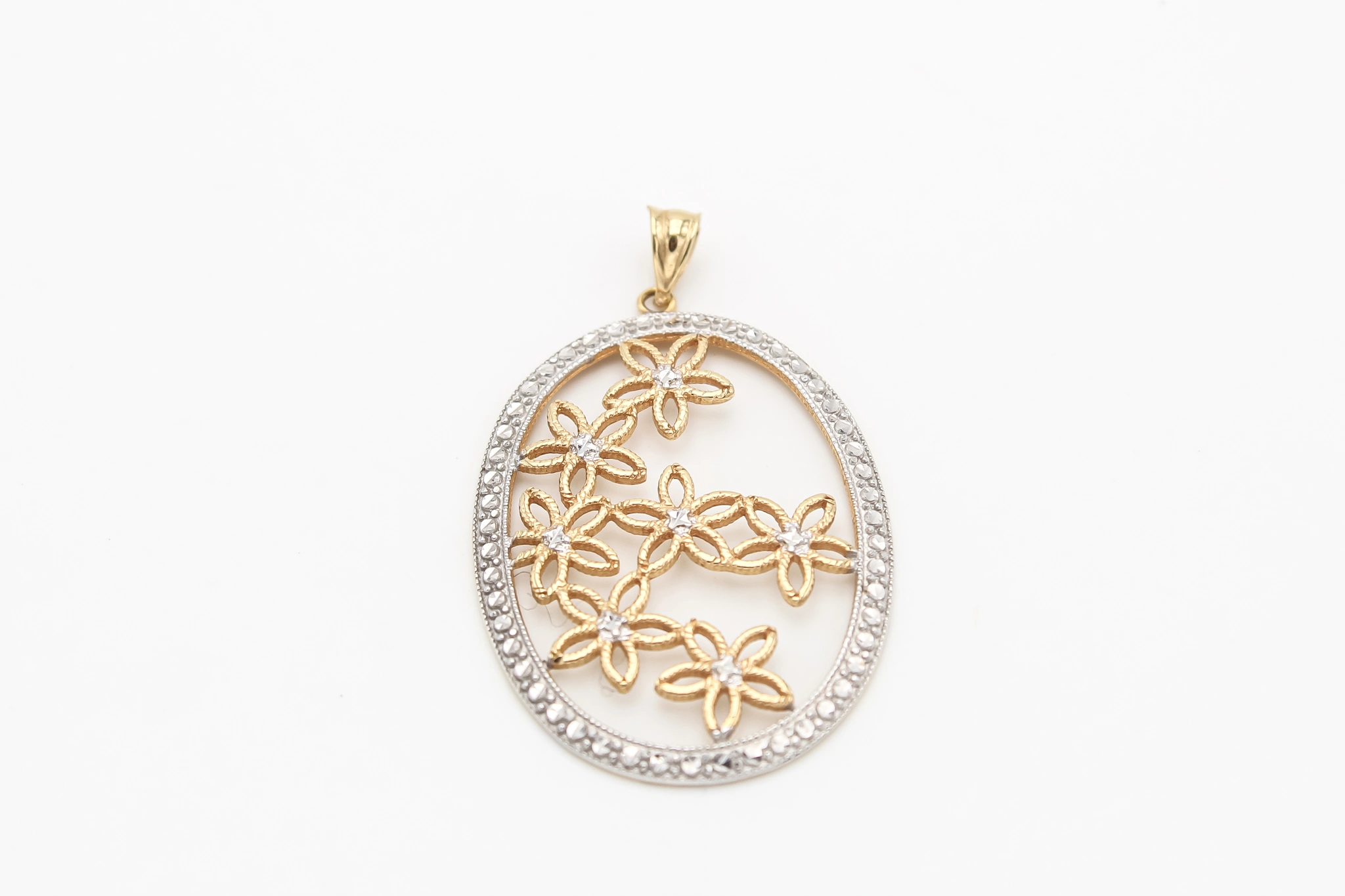 Colgante forma de flor de oro combinado 18K