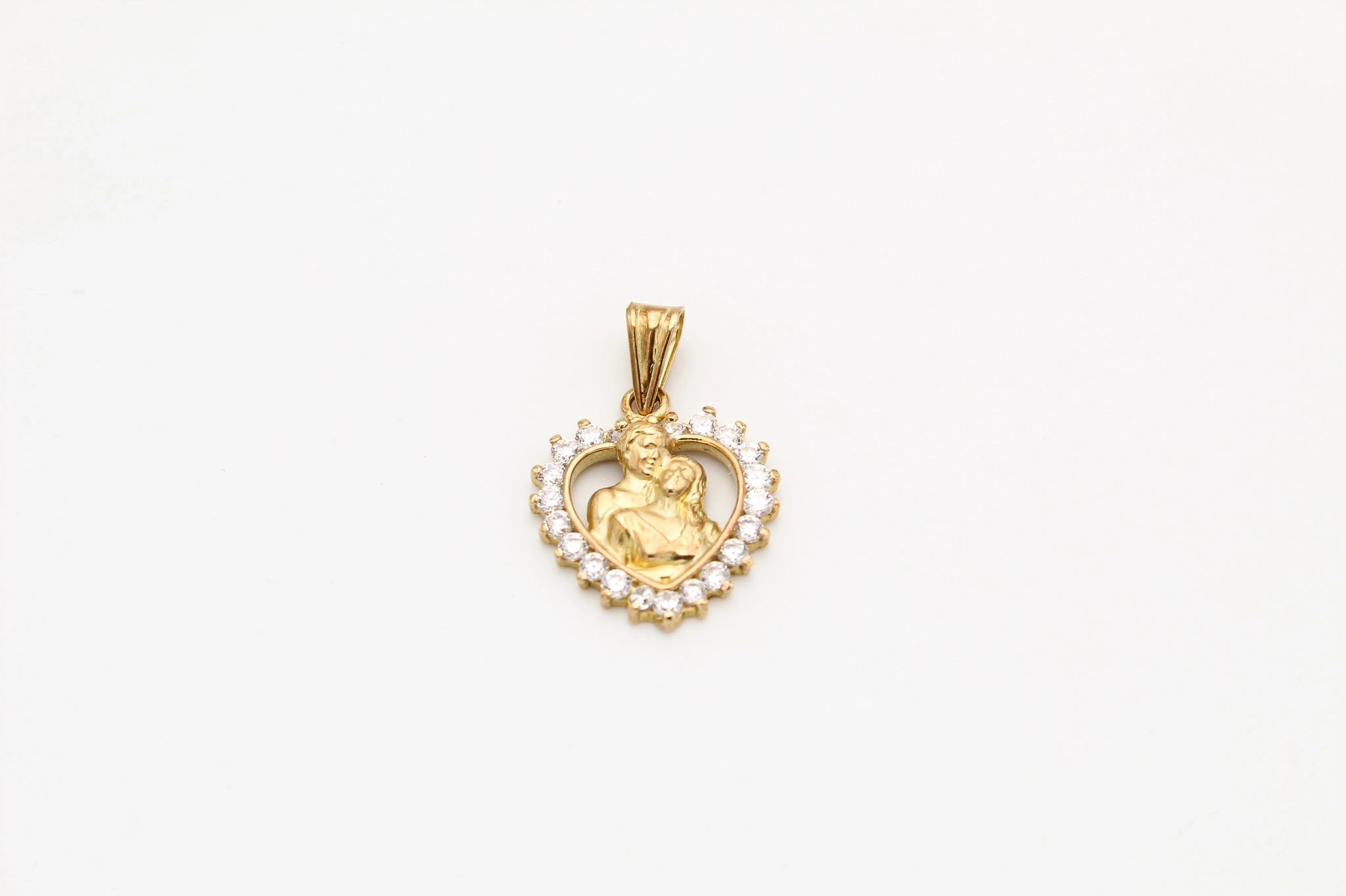 Colgante de oro con forma de corazón Virgen del Carmen 18K