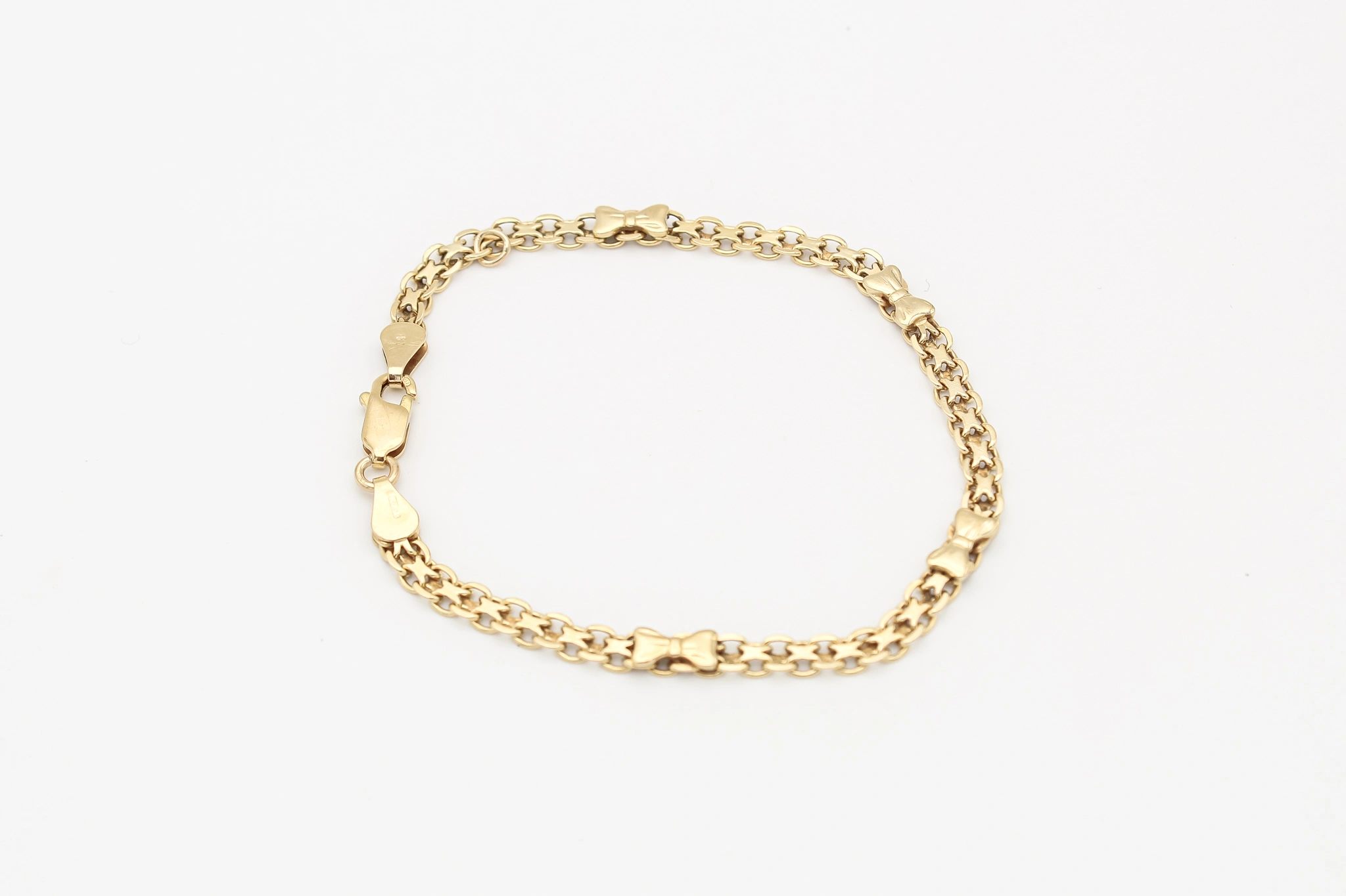 Pulsera de oro 18K con lazos