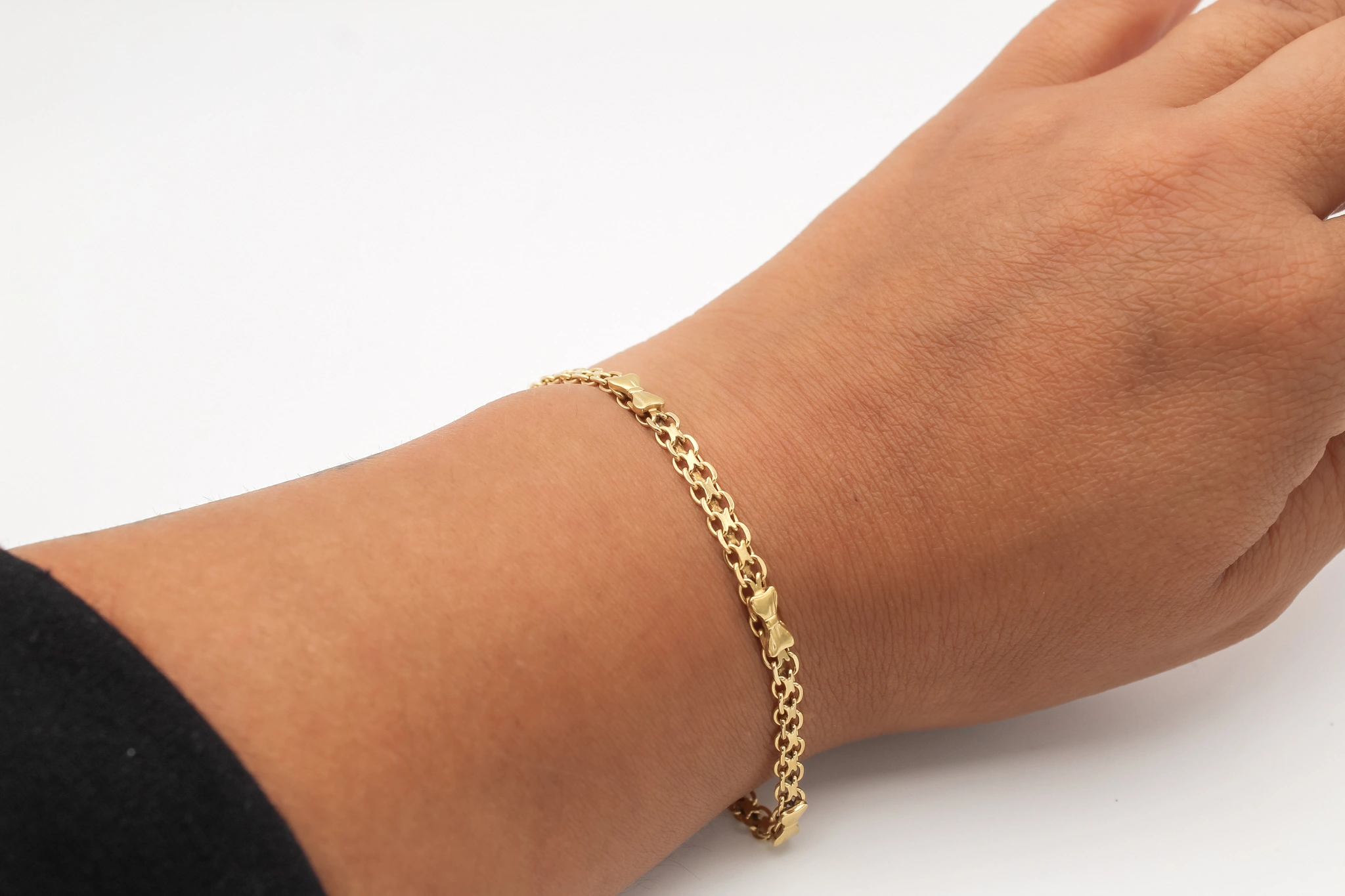 Pulsera de oro 18K con lazos — foto 3
